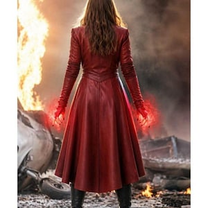 May include: A long-sleeved, deep red leather coat with a fitted bodice and a flared, knee-length skirt. The coat features structured shoulders, long sleeves with matching red leather gloves, and black leather boots with block heels.