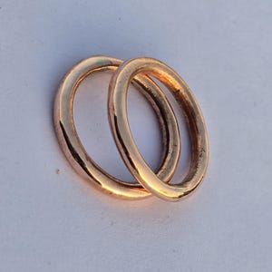 Handgjorda stapelringar i massiv koppar, set om 2, minimalistiska runda kopparband, enkelt stapelringset, unisexpresent till 7-årsjubileum