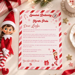 May include: A Christmas elf doll with a red hat and striped tights sits next to a letter titled Special Delivery From The North Pole addressed to Layla. The letter features red and pink candy cane borders, snowflakes, and a small elf graphic.