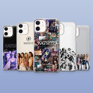 May include: Five clear phone cases featuring various designs of the group KATSEYE. Designs include a black background with signatures, a minimalist logo, a photo collage with a central star emblem, a black and white graphic, and a group photo.
