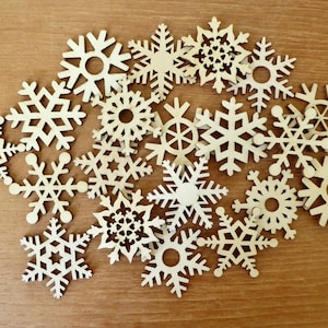 20 2 inch laser cut wood snowflakes for crafting, ten different patterns, two of each pattern