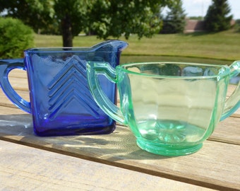Vaseline glass open sugar bowl and cobalt blue Hazel Atlas chevron creamer, sold as a set of two