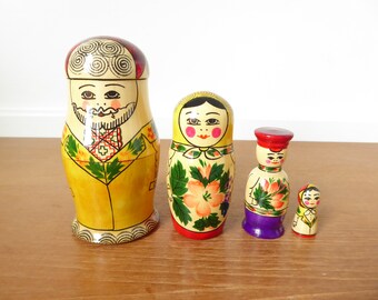 Yellow matroyshka doll family of four