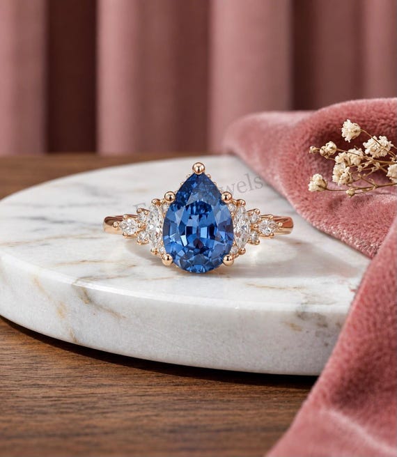 Pear Sky Blue Topaz Ring, Cluster Moissanite Engagement Ring, 14K Rose Gold Ring, December Birthstone Jewelry, Unique Teardrop Promise Ring.