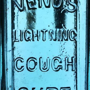 Färgglad blixthostbot antik flaska