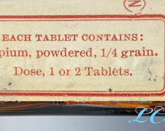 Frasco antiguo original de pastillas de opio en polvo de Parke Davis con tapón de corcho, grabado en relieve y etiquetado.