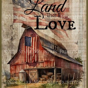 May include: A red barn with a weathered wood exterior and a faded American flag hanging from the side. The barn is surrounded by green grass and a wooden fence. The text "Land That I Love" is written in black cursive letters on a background of faded blue and white.