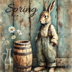 May include: A watercolor painting of a brown rabbit wearing overalls standing next to a wooden barrel and a glass bottle. The background is a blue wooden wall with the word "Spring" written in black cursive. The painting has a vintage, rustic feel.