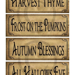 May include: Four vintage-style printable signs with autumn-themed text. The signs read "Harvest Thyme", "Frost on the Pumpkins", "Autumn Blessings", and "All Hallows Eve".