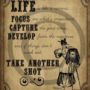 May include: A vintage-style illustration of a woman with a camera on a tripod. The text reads "Life is like a camera... Focus on what's important, Capture the good times, Develop from the negatives, and if things don't work out, Take another shot."
