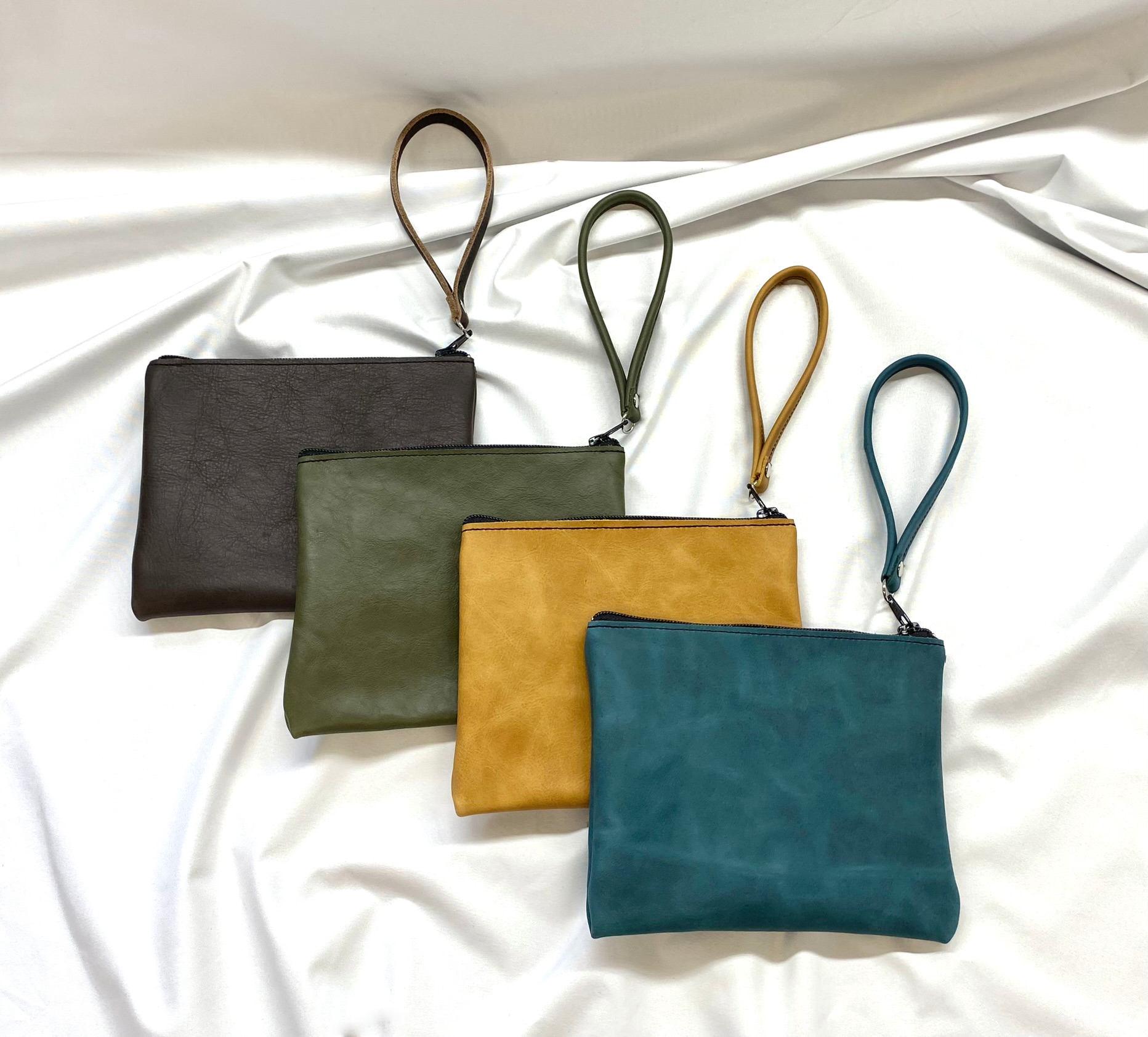 CLUTCH WITH WRISTLET MEET ME IN MALLORCA