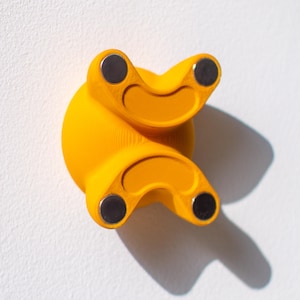 Supporto da parete invisibile per skateboard