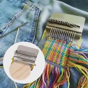 May include: A metal darning loom tool featuring a circular wooden base and a series of vertical metal hooks used for weaving. The device is shown both in a circular inset and in use, creating a colourful, multi-hued woven patch on blue denim fabric.