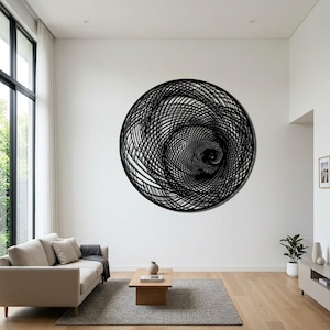 May include: A large circular wall art piece featuring a complex black geometric pattern of intersecting lines and concentric circles that create a deep, swirling vortex effect. The design is composed of thin, dark lines arranged in a dense, layered grid.