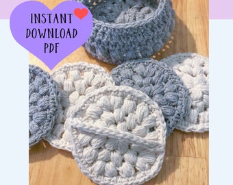 Peut inclure: Image de débarbouillettes faites à la main et crochetées, ainsi qu'un porte-savon assorti. Les débarbouillettes sont grises et crème, avec un motif circulaire texturé. L'image comprend également le texte "Face Scrubbies Crochet Pattern."