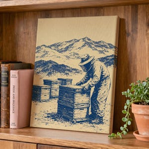 May include: A rectangular canvas print featuring a blue ink illustration on a tan background. The artwork depicts a beekeeper in protective gear tending to stacked wooden beehives in a field with a mountain range in the background.