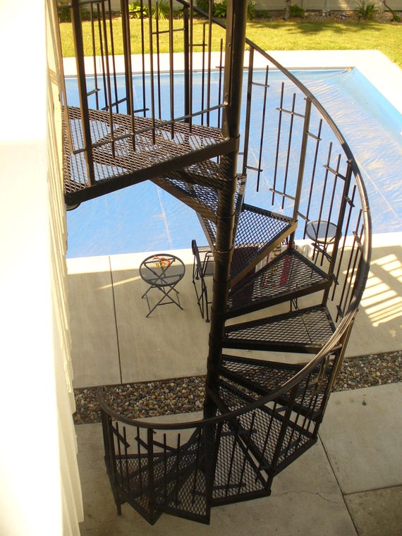 Spiral Staircase 64" with 1/2" rod railing design. Made with solid materials, No. plastic here