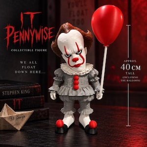 May include: A Pennywise collectible figure holding a red balloon, standing 40 cm tall. The figure features a white face with red makeup, a grey ruffled outfit with red buttons, and black shoes with red pom-poms. Text includes IT PENNYWISE, WE ALL FLOAT DOWN HERE, and SS Georgie.
