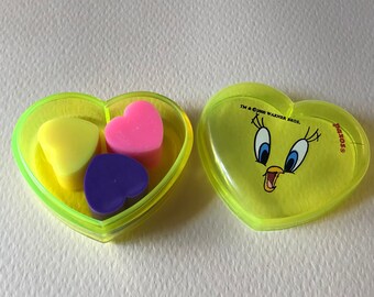 Vintage Tweety Bird Cased Eraser. Yellow Plastic Heart Case with Tiny Heart Erasers. Paxos school supplies. Warner Bros 2000 novelty eraser