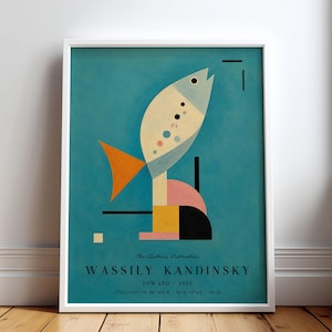May include: A framed art print featuring Wassily Kandinsky's Upward 1929. The teal poster displays a stylised fish shape composed of geometric forms in cream, orange, pink, yellow, and black, with text at the bottom reading The Gallery Collection.
