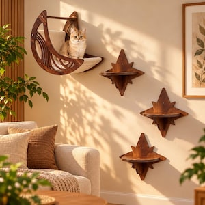 May include: A crescent moon-shaped wooden cat bed with a cream-colored fabric cushion, occupied by a light brown cat, accompanied by three star-shaped wooden wall-mounted shelves arranged in a vertical pattern on the wall.