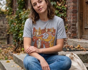 Professionally Tired Shirt, Groovy 70s Wavy Typography Tee, Retro Sleepy Crescent Moon Graphic T-Shirt, Cozy Napping Enthusiast Slacker Gift