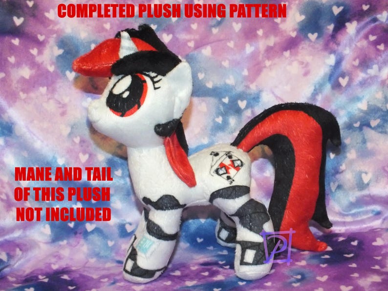 May include: A white plush pony with black and red hair. The pony has a black and white pattern on its body and a red and black tail. The pony is standing on a purple and white background. The text "MANE AND TAIL OF THIS PLUSH NOT INCLUDED" is visible in the image.