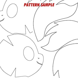 May include: A printable pattern for a cartoon animal mask. The pattern includes two animal heads with large eyes and a tail.