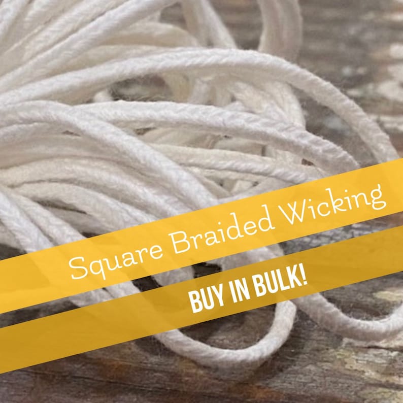May include: Close-up of white square braided candle wicking. The wicking is in a pile and the text "Square Braided Wicking" and "BUY IN BULK!" is on a yellow banner.