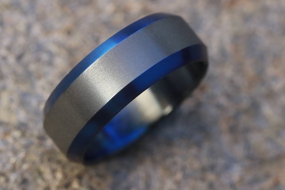 Black titanium ring blue titanium 8mm wide black chamfered titanium ring