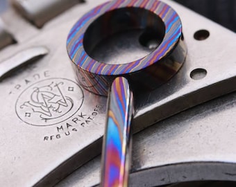 Timascus, Titanium damascus handcuff key