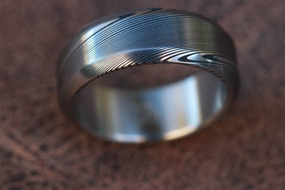 Chamfered mens damascus ring. Damasteel ring.