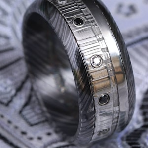 Black diamonds and gold,  black titanium zrti & damasteel ring 9mm wide customizable