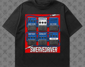 May include: A black short-sleeve t-shirt featuring a graphic print on a red background. The print displays six blue guitar effect pedals connected by blue cables, labeled Rave Down, Distortion Pro, Sci-Flyer, Deep Seat, Sandblast, and Pile Up.