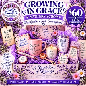 May include: A gift box titled Growing in Grace Mystery Scoop containing a pink mug, a candle, a tumbler, a notebook, a pen, and a metal scoop. The items feature floral patterns and religious text including Be Still and Know and Faith can move Mountains.