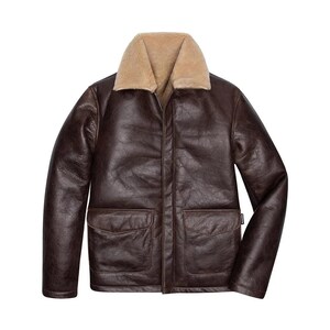 May include: A dark brown leather jacket featuring a tan shearling collar and interior lining. The jacket includes long sleeves, a front zipper closure concealed by a placket, and two large rectangular patch pockets with flaps on the front.
