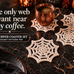 May include: A set of off-white crocheted spiderweb coasters. The image features text that reads: The only web I want near my coffee. SPIDERWEB COASTER SET CROCHET PATTERN PDF. The coasters are arranged on a dark surface with copper mugs.