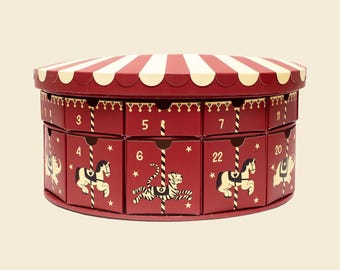 Caja de regalo con calendario de adviento de carrusel
