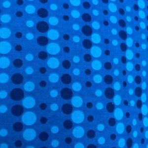 Vibrant dots on blue - By the Yard