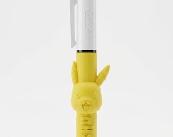 May include: A multi-color retractable ballpoint pen featuring a white top section with blue, green, and black ink selectors and a yellow lower barrel. The barrel includes a molded Pikachu character head and the embossed text PIKACHU.