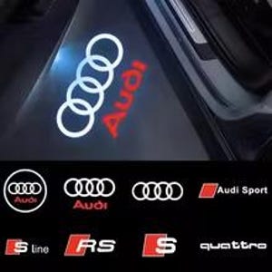 May include: A collection of Audi vehicle logos and emblems, including the four-ring symbol in white, the Audi wordmark in red, and various branding badges such as Audi Sport, S line, RS, S, and quattro, displayed against a dark background.
