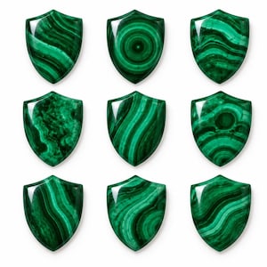 May include: Nine shield-shaped cabochons made of polished malachite, each displaying unique natural banding patterns in varying shades of deep forest green and lighter emerald green, arranged in a three-by-three grid formation.