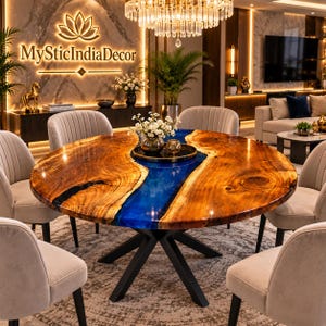 Runder Esstisch aus blauem Epoxidharz, Esstisch aus Massivholz mit Baumkante, Tisch mit markantem Spinnenbein-Design, handgefertigte Luxus-Esszimmermöbel