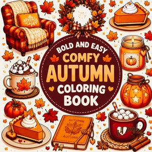 May include: A colouring book cover titled BOLD AND EASY COMFY AUTUMN COLOURING BOOK, featuring illustrations of a plaid armchair, pumpkin pie, a lit candle, a mug of hot cocoa with marshmallows, a pumpkin, and a book, all surrounded by autumn leaves.