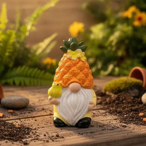May include: A gnome figurine featuring a textured orange pineapple-shaped hat topped with green leaves and yellow flowers. The gnome has a long white beard, a round nose, and wears black shoes. A small yellow bird is perched on the gnome's left side.