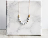Marble necklace - white howlite and brass