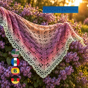May include: A triangular crochet shawl featuring a gradient color transition from pale green at the edges to shades of pink and orange in the center. The shawl has an intricate openwork floral pattern and a scalloped border. Text reads CROCHET PATTERN.