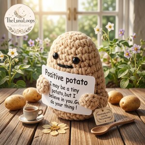 May include: A tan crocheted potato figure with black bead eyes and a stitched mouth, holding a white sign that reads: Positive potato I may be a tiny potato, but I believe in you. Go do your thing! A small tag reads Handmade with Love by The LunaLoops.