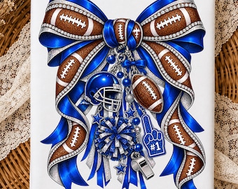 May include: A large decorative bow featuring a brown football texture with white laces and blue ribbon accents. Dangling charms include a blue football helmet, a brown football, a blue pom-pom, a blue foam finger with the number 1, and a silver whistle.