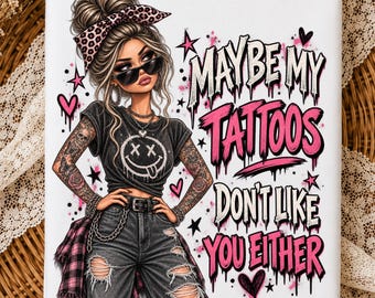 May include: A white rectangular print featuring an illustration of a person with a messy bun, leopard print headband, and sunglasses. The person wears a black t-shirt with a smiley face, ripped jeans, and tattoos. Text reads: MAYBE MY TATTOOS DON'T LIKE YOU EITHER.
